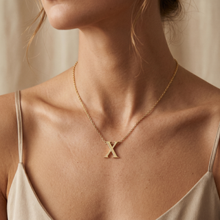 Model wearing 9K Yellow Gold Plain 'X' Initial Pendant - Sonny's Jewellers