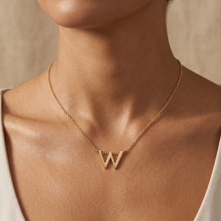 Model wearing 9K Yellow Gold Plain 'W' Initial Pendant - Sonny's Jewellers