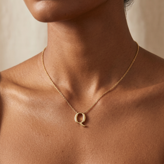 Model wearing 9K Yellow Gold Plain 'Q' Initial Pendant - Sonny's Jewellers
