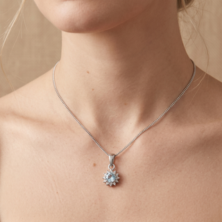 Model wearing 9K White Gold Aquamarine & Diamond Halo Pendant - Sonny's Jewellers