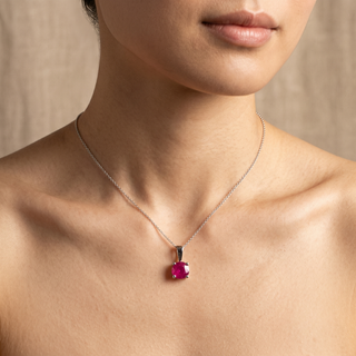 Model wearing 9K White Gold 5mm Round Ruby Pendant - Sonny's Jewellers
