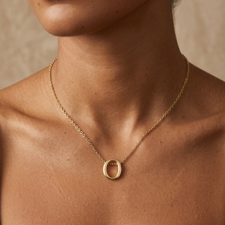 Model wearing 9K Yellow Gold Plain 'O' Initial Pendant - Sonny's Jewellers