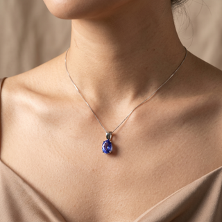 Model wearing 9K White Gold Oval Tanzanite Pendant - Sonny's Jewellers