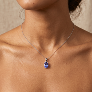 Model wearing 9K White Gold Oval Cut Tanzanite Pendant - Sonny's Jewellers