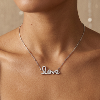 Model wearing 18K White Gold Diamond Love Necklace - Sonny's Jewellers