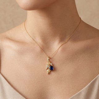 Model wearing 9K Yellow Gold Sapphire & Diamond Leaf Pendant - Sonny's Jewellers