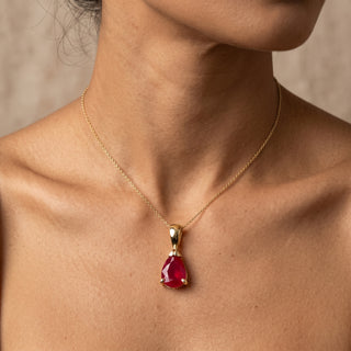 Model wearing 9K Yellow Gold Pear Cut Ruby Pendant - Sonny's Jewellers
