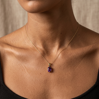 Model wearing 9K Yellow Gold Oval Amethyst Pendant - Sonny's Jewellers