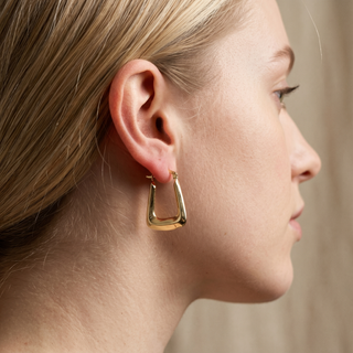 Model wearing 9K Yellow Gold Handbag Creole Hoop Earrings - Sonny's Jewellers