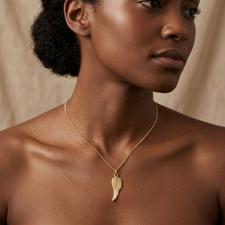 Model wearing 9K Yellow Gold Angel Wing Pendant - Sonny's Jewellers