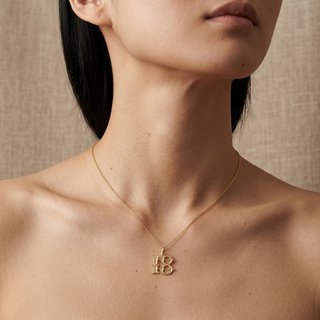 Model wearing 9ct Yellow Gold '18' Pendant - Sonny's Jewellers
