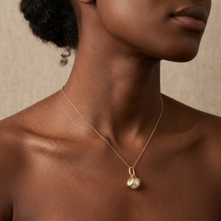 Model wearing 9K Yellow Gold Shell & 5mm Freshwater Pearl Pendant - Sonny's Jewellers