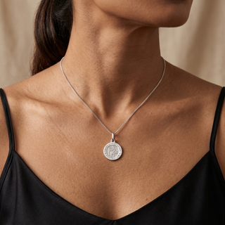 Model wearing 9K White Gold St Christopher Round Satin Pendant - Sonny's Jewellers