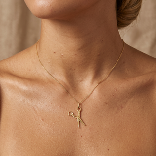 Model wearing 9K Yellow Gold Scissor Pendant - Sonny's Jewellers