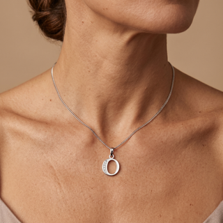 Model wearing 9K White Gold CZ 'O' Initial Pendant - Sonny's Jewellers