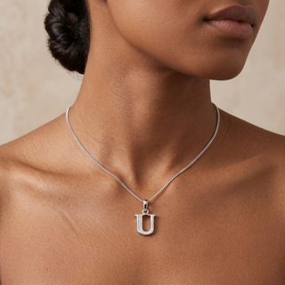 Model wearing 9K White Gold CZ 'U' Initial Pendant - Sonny's Jewellers