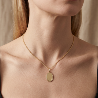 Model wearing 9K Yellow Gold Rope-Edge Oval Pendant - Sonny's Jewellers