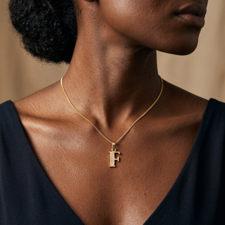 Model wearing 9K Yellow Gold CZ 'F' Initial Pendant - Sonny's Jewellers