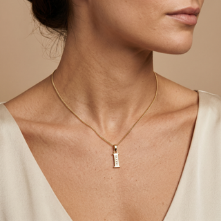 Model wearing 9K Yellow Gold CZ 'I' Initial Pendant - Sonny's Jewellers