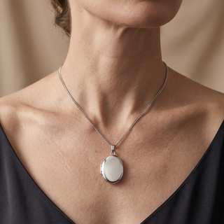 Model wearing 9K White Gold Plain Oval Locket - Sonny's Jewellers