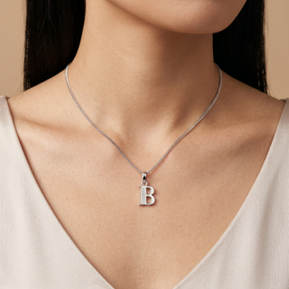Model wearing 9K White Gold CZ 'B' Initial Pendant - Sonny's Jewellers
