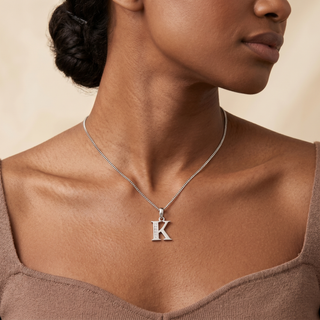 Model wearing 9K White Gold CZ 'K' Initial Pendant - Sonny's Jewellers
