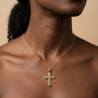 Model wearing 9K Yellow Gold Flared Cross Pendant - Sonny's Jewellers