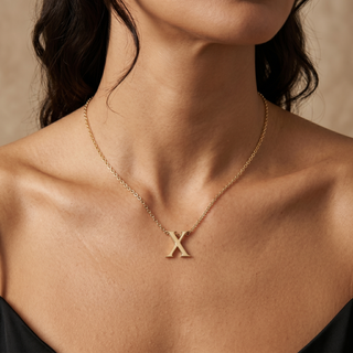 Model wearing 9K Yellow Gold Plain 'X' Initial Pendant Necklace - Sonny's Jewellers