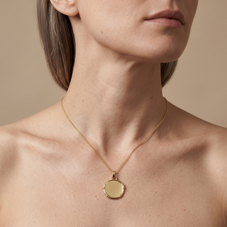 Model wearing 9K Yellow Gold Bow-Edge Disc Pendant - Sonny's Jewellers