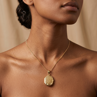 Model wearing 9K Yellow Gold Fabric-Backed Tree of Life Locket - Sonny's Jewellers
