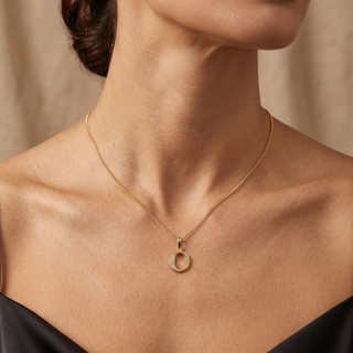 Model wearing 9K Yellow Gold CZ O Initial Pendant - Sonny's Jewellers