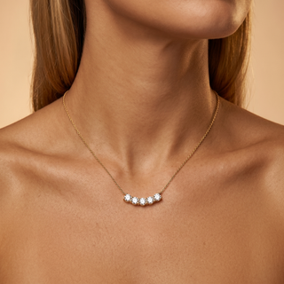 Model wearing 9K Yellow Gold CZ Curved Bar Pendant - Sonny's Jewellers