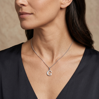 Model wearing 9K White Gold CZ G Initial Pendant - Sonny's Jewellers