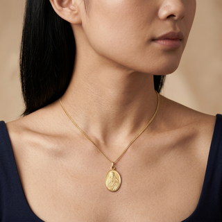 Model wearing 9K Yellow Gold Jesus Sacred Heart Medallion Pendant - Sonny's Jewellers