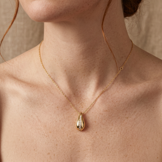 Model wearing 9K Yellow Gold 1mm CZ Teardrop Necklace - Sonny's Jewellers