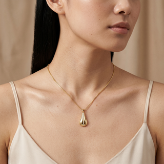 Model wearing 9K Yellow Gold 1mm CZ Teardrop Necklace 17-18 - Sonny's Jewellers