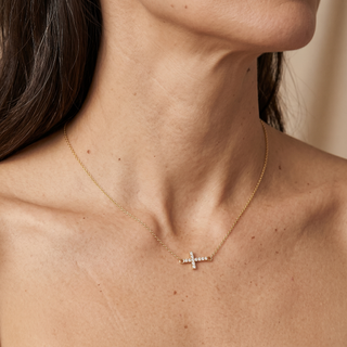 Model wearing 9K Yellow Gold Cubic Zirconia Cross Necklace - Sonny's Jewellers