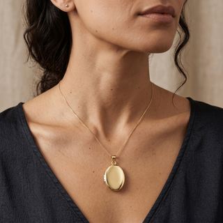 Model wearing 9K White Gold Polished Oval Locket - Sonny's Jewellers