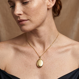 Model wearing 9K Yellow Gold Heart Locket - Sonny's Jewellers