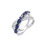 Silver Cross Over Clear & Blue CZ Ring