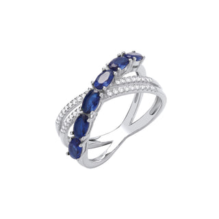 Silver Cross Over Clear & Blue CZ Ring