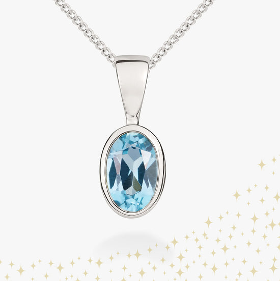Aquamarine blue gemstone pendant with sparkles