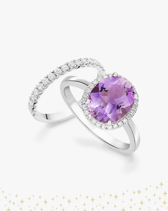 Purple gemstone ring and diamond wedding band with sparkles