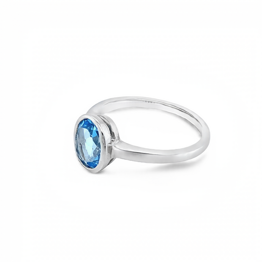 9K White Gold Solitaire Blue Topaz Ring